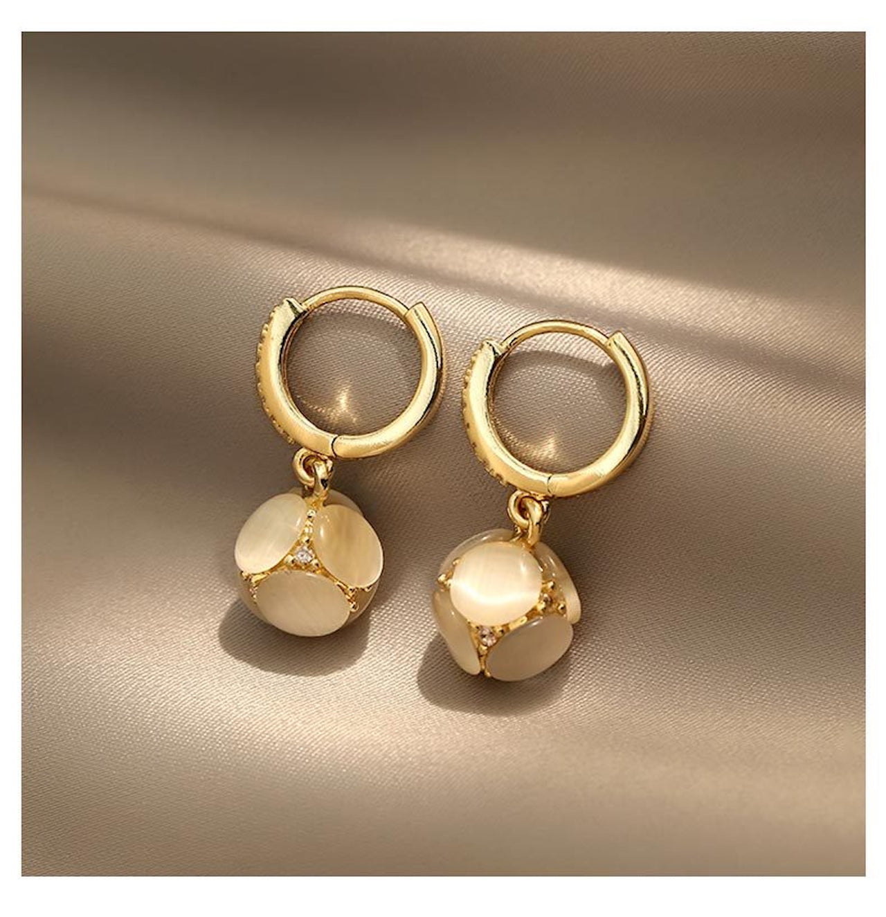 Elegant Cat’s Eye Stud Earrings – Light Luxury Design with Soft Shine & Timeless Charm