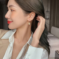 Elegant Cat’s Eye Stud Earrings – Light Luxury Design with Soft Shine & Timeless Charm