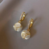 Elegant Cat’s Eye Stud Earrings – Light Luxury Design with Soft Shine & Timeless Charm